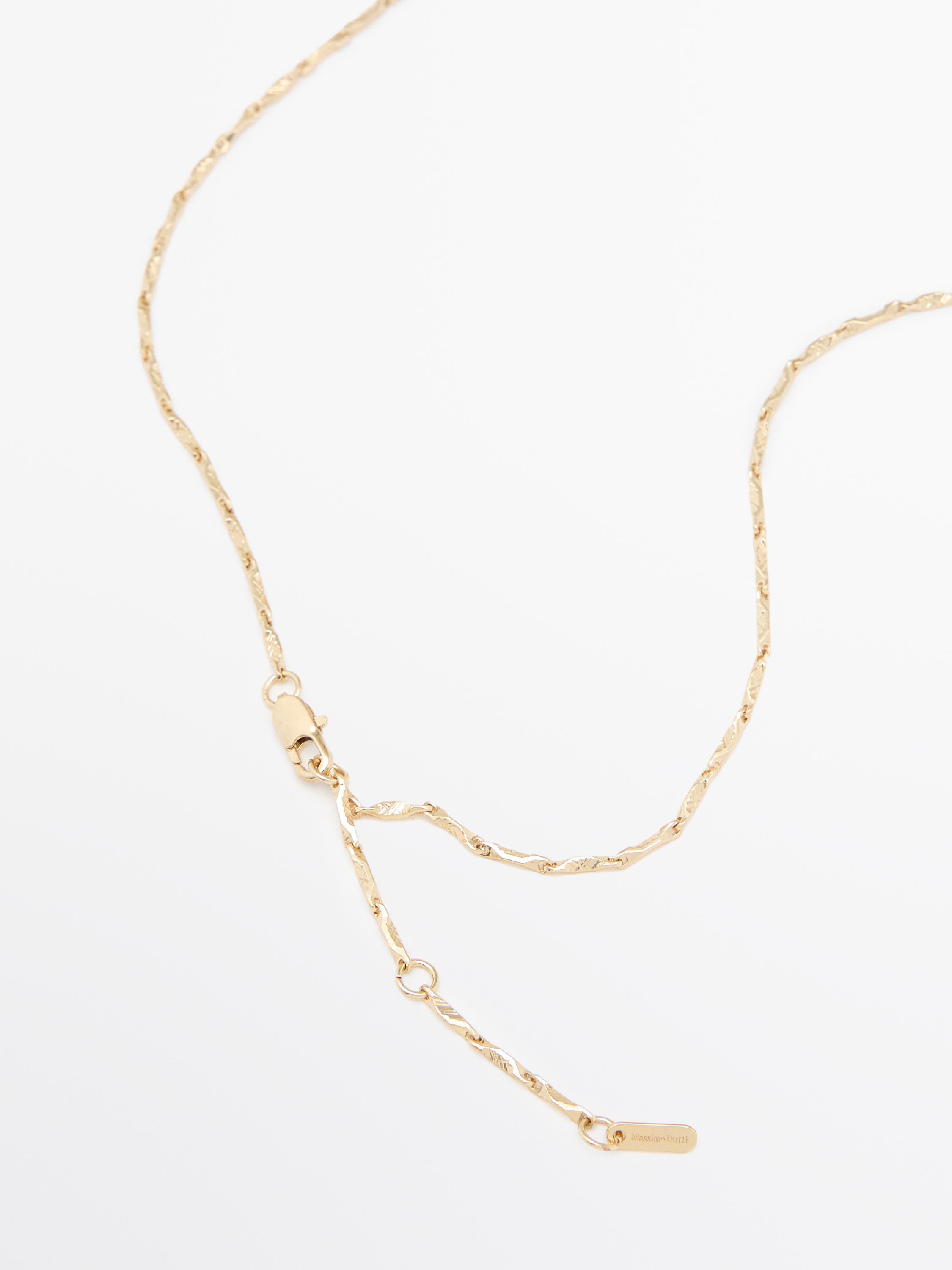 Pendant necklace with metal signet piece
